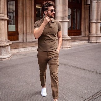 Dark Brown Polo Outfits For Men: This pairing of a dark brown polo and brown cargo pants is very easy to throw together and so comfortable to wear a variation of as well! Introduce white canvas low top sneakers to the mix to pull your full outfit together.