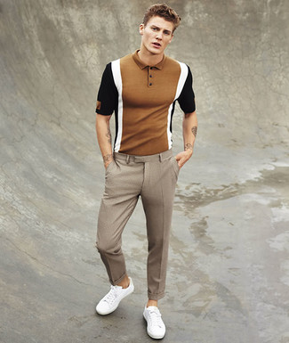 Dark Brown Polo Outfits For Men: Such essentials as a dark brown polo and brown check dress pants are an easy way to inject some polish into your casual collection. Go the extra mile and shake up your look by finishing with white low top sneakers.