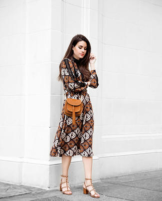 Tobacco Leather Crossbody Bag Outfits: A brown print midi dress and a tobacco leather crossbody bag are great must-haves to have in your casual styling repertoire. Give your look an added dose of chic by rounding off with tobacco leather heeled sandals.