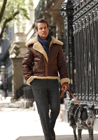 Navy Scarf Outfits For Men: You'll be surprised at how super easy it is for any gent to pull together an urban look like this. Just a brown shearling jacket worn with a navy scarf.