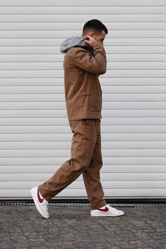 Brown Chinos Fall Outfits: A brown shirt jacket and brown chinos are good for both smart casual occasions and day-to-day wear. Feeling venturesome? Tone down your look with white and red leather high top sneakers. There's no nicer way to brighten up a gloomy autumn afternoon than a cool ensemble like this one.