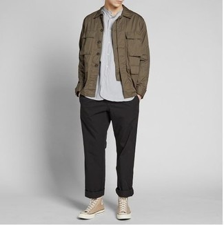 Brown Shirt Jacket Outfits For Men: For an ensemble that's worthy of a modern fashion-savvy man and casually neat, try pairing a brown shirt jacket with black chinos. Introduce beige canvas high top sneakers to the mix to easily ramp up the appeal of your outfit.