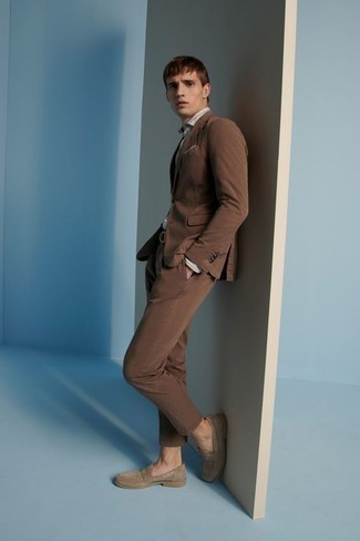 Brown Suit Outfits: You're looking at the solid proof that a brown suit and a beige vertical striped dress shirt look awesome together in an elegant outfit for a modern guy. Introduce brown suede loafers to this outfit and the whole outfit will come together.