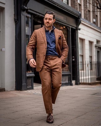 Brown Woven Leather Tassel Loafers Outfits: This pairing of a brown suit and a navy polo neck sweater is a real lifesaver when you need to look like a true connoisseur of men's fashion. Complement your outfit with brown woven leather tassel loafers et voila, your getup is complete.
