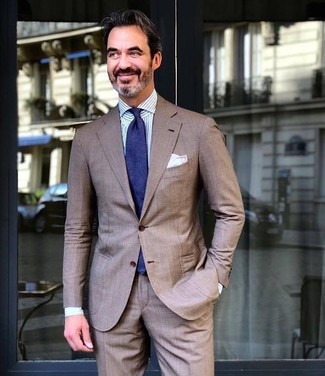 Dark Brown Suit with Dress Shirt Dressy Warm Weather Outfits: Reach for a dark brown suit and a dress shirt to look like a true fashion connoisseur.