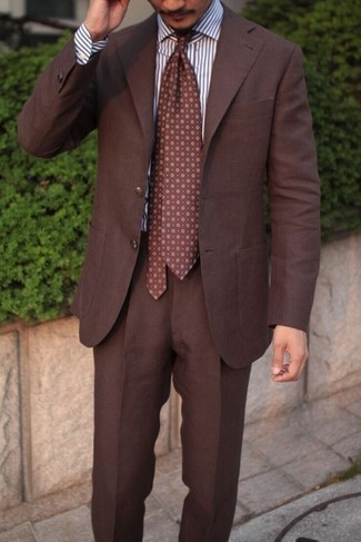 Brown Print Tie Outfits For Men: Dress in a brown suit and a brown print tie to look like a perfect dandy at all times.
