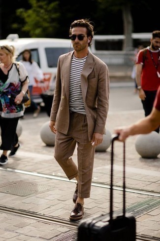 Dark Brown Leather Derby Shoes Outfits: A brown vertical striped suit and a white and navy horizontal striped crew-neck t-shirt are totally worth being on your list of true menswear essentials. And if you need to instantly lift up this outfit with shoes, complete this getup with dark brown leather derby shoes.
