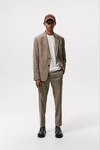 Brown Plaid Suit Outfits: This combo of a brown plaid suit and a white crew-neck t-shirt is a fail-safe option when you need to look effortlessly neat but have no time. Wondering how to finish this ensemble? Rock a pair of black leather chelsea boots to ramp it up a notch.