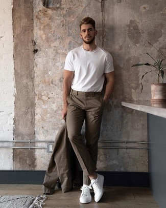 Brown Suit Outfits: Opt for a brown suit and a white crew-neck t-shirt if you're aiming for a clean, sharp getup. For a more casual touch, complement this outfit with white canvas low top sneakers.