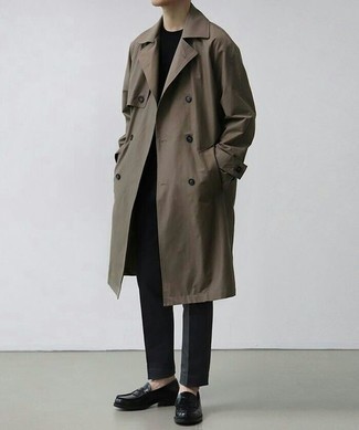 Brown Trenchcoat Outfits For Men: This combo of a brown trenchcoat and black chinos is a never-failing option when you need to look casually neat but have no time to spare. Complement this look with black leather loafers to easily ramp up the fashion factor of any ensemble.