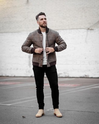 Brown Varsity Jacket Outfits For Men: If you enjoy practical style, rock a brown varsity jacket with black jeans. Add a different twist to this getup by slipping into a pair of beige suede chelsea boots.
