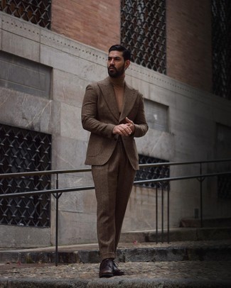 Tan Turtleneck Outfits For Men: Pairing a tan turtleneck and a brown wool suit will prove your styling expertise. This outfit is rounded off really well with a pair of dark brown leather brogues.