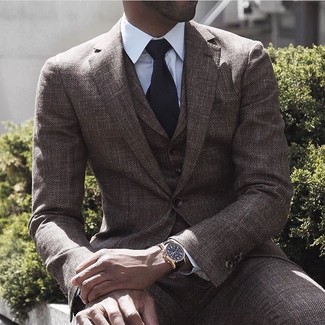 Brown Three Piece Suit Outfits: Consider teaming a brown three piece suit with a white dress shirt for a neat classy getup.