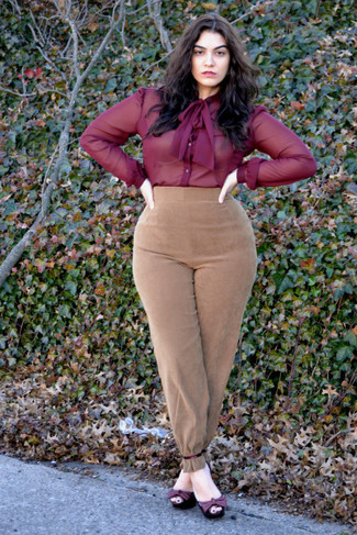 Tan Suede Tapered Pants Outfits For Women: Marrying a burgundy chiffon dress shirt with tan suede tapered pants is a great option for a smart and refined getup. A pair of burgundy leather heeled sandals is a good idea to finish off this outfit.
