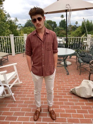 Red Long Sleeve Shirt Outfits For Men: Team a red long sleeve shirt with white chinos to assemble a casual and cool ensemble. Not sure how to finish off this outfit? Finish off with a pair of brown leather tassel loafers to ramp up the classy factor.