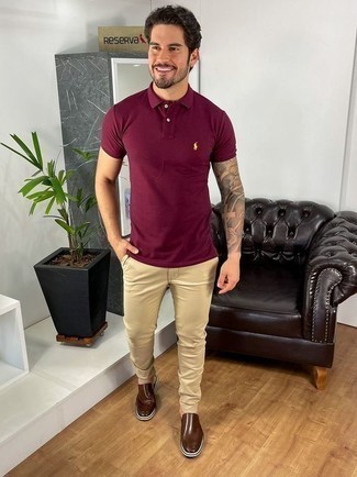Men's Outfits 2022: A burgundy polo and khaki chinos are the ideal way to introduce subtle dapperness into your current styling arsenal. Take your getup in a dressier direction by wearing a pair of dark brown leather loafers.