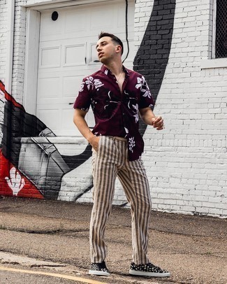 Beige Vertical Striped Chinos Outfits: Team a burgundy floral short sleeve shirt with beige vertical striped chinos for a fuss-free look that's also well-executed. Consider black and white print canvas low top sneakers as the glue that brings this outfit together.