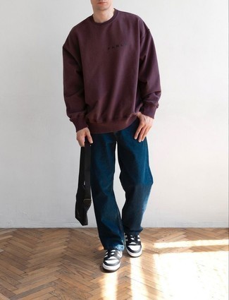 500+ Fall Outfits For Men: A burgundy sweatshirt and navy jeans make for the ultimate laid-back ensemble for any man. A pair of white and black leather low top sneakers finishes this look quite nicely. As you can see here, it's extremely easy to look awesome and stay snug when chillier days are here, all thanks to combinations like this.