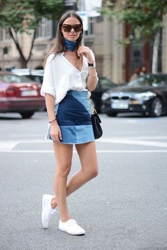 White Plimsolls Outfits For Women: For a casual outfit, wear a white button down blouse with a blue patchwork mini skirt — these pieces go nicely together. Go ahead and complete this ensemble with white plimsolls for a dash of playfulness.