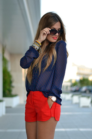 Multi colored Bracelet Outfits: A navy polka dot button down blouse and a multi colored bracelet are a great getup to have in your current off-duty arsenal.