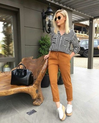 White and Black Vertical Striped Button Down Blouse Outfits: This combination of a white and black vertical striped button down blouse and tobacco skinny pants is well-executed and yet it looks casual and apt for anything. White leather platform loafers are a fitting idea here.