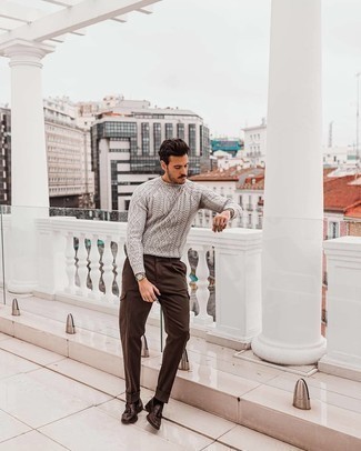 Charcoal Cable Sweater Outfits For Men: Consider pairing a charcoal cable sweater with dark brown cargo pants to flaunt your styling smarts. Add dark brown leather tassel loafers to the equation to take things up a notch.