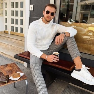 White Cable Sweater Outfits For Men: A white cable sweater and grey houndstooth chinos are a nice go-to outfit to keep in your wardrobe. A pair of white and black leather low top sneakers makes this getup complete.