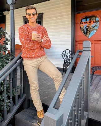 Beige Snow Boots Outfits For Men: Putting together an orange cable sweater with khaki chinos is a good choice for a casually cool look. Clueless about how to finish off? Introduce a pair of beige snow boots to your look for a more relaxed take.