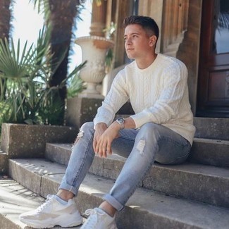 White Cable Sweater Outfits For Men: For a casual ensemble, Pair a white cable sweater with light blue ripped jeans. For a more relaxed touch, complement this ensemble with white athletic shoes.