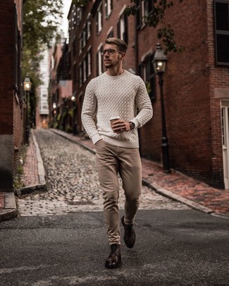 Tan Cable Sweater Outfits For Men: For a casual and cool look, dress in a tan cable sweater and khaki jeans — these pieces work pretty good together. Dark brown leather casual boots are an effortless way to inject an extra touch of style into this getup.