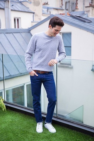 Grey Cable Sweater Outfits For Men: Team a grey cable sweater with blue jeans for an everyday look that's full of charm and character. Complement this ensemble with a pair of white leather low top sneakers and ta-da: the ensemble is complete.