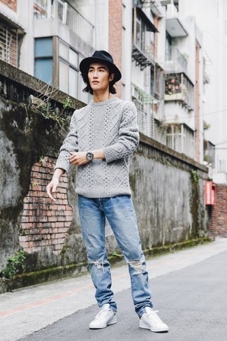 Men's Grey Cable Sweater, Light Blue Ripped Jeans, White and Green Canvas Low Top Sneakers, Navy Wool Hat
