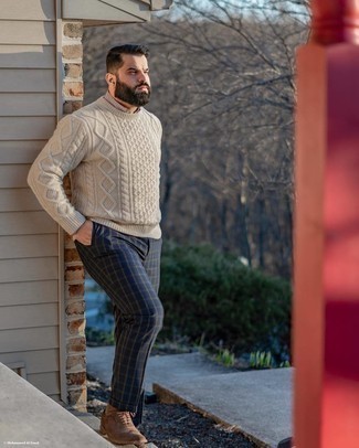 Beige Cable Sweater Outfits For Men: For a casual ensemble, try pairing a beige cable sweater with navy check chinos — these two pieces fit perfectly well together. Put a more elegant spin on your outfit by finishing off with brown suede brogues.