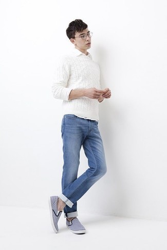 White and Navy Long Sleeve Shirt Casual Spring Outfits For Men In Their Teens: If you enjoy a more casual approach to fashion, why not consider teaming a white and navy long sleeve shirt with blue jeans? On the shoe front, this outfit pairs brilliantly with light blue canvas slip-on sneakers. With the departure of winter come warmer afternoons and balmy nights and the need for a neat getup just like this one. Wondering how to nail casual dressing as you progress through your teenage years? This combo is a wonderful example.