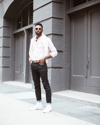 Pink Long Sleeve Shirt Outfits For Men: A pink long sleeve shirt and charcoal jeans are a go-to combination for many fashion-savvy men. Infuse a more casual vibe into this look by finishing with a pair of white canvas high top sneakers.