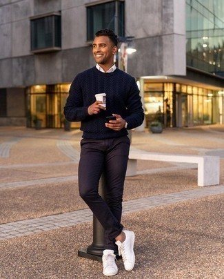 Violet Chinos Outfits: A navy cable sweater looks so nice when matched with violet chinos. For a more laid-back finish, why not complete your outfit with white leather low top sneakers?