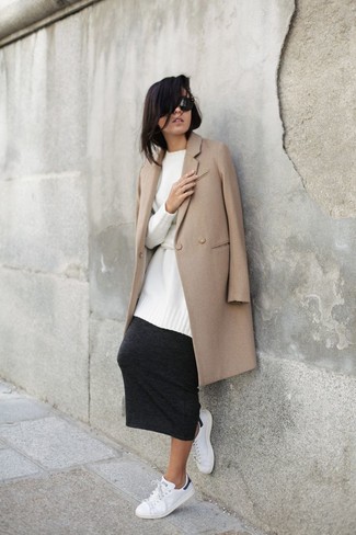 White Canvas Low Top Sneakers Outfits For Women: If the setting calls for a polished yet cool getup, wear a camel coat with a charcoal midi skirt. A cool pair of white canvas low top sneakers is an easy way to give an element of casualness to this ensemble.