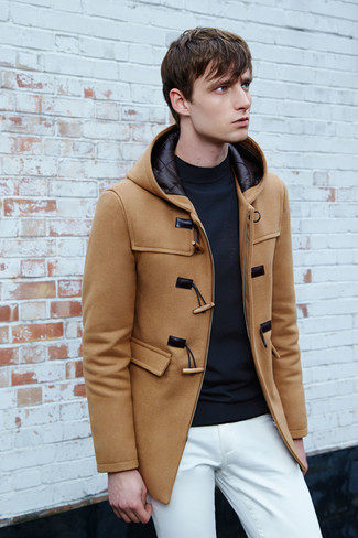 Consider pairing a camel duffle coat with white chinos to assemble a casually sleek and pulled together ensemble.