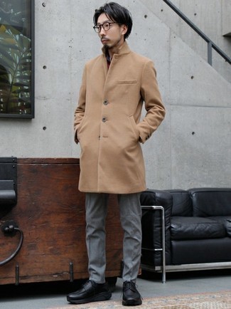 Tan Coat Outfits For Men: This classic and casual pairing of a tan coat and grey chinos can go in different directions depending on the way you style it out. Feeling venturesome? Switch things up by rounding off with black chunky leather derby shoes.