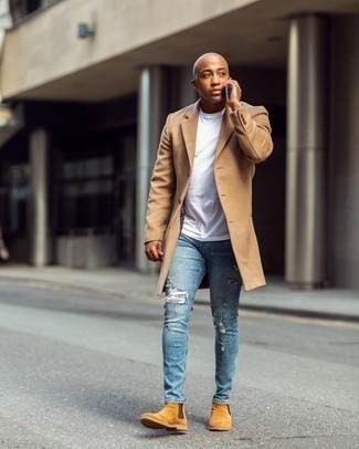 Tobacco Suede Chelsea Boots Outfits For Men: Flaunt your chops in men's fashion by teaming a camel overcoat and light blue ripped skinny jeans for an off-duty combination. If you wish to instantly class up your outfit with one item, why not add tobacco suede chelsea boots to your look?