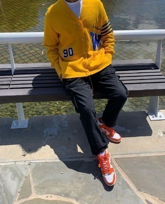 Yellow Leather Low Top Sneakers Outfits For Men: For an ensemble that's city-style-worthy and casually neat, go for a mustard cardigan and a black cardigan. Feeling transgressive today? Break up this ensemble by finishing with yellow leather low top sneakers.