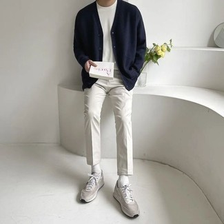 White Socks Outfits For Men: Wear a navy cardigan and white socks to effortlessly deal with whatever this day throws at you. Let your outfit coordination sensibilities really shine by complementing your look with a pair of grey athletic shoes.
