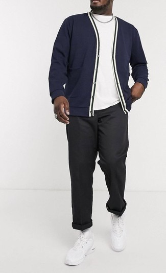 White Athletic Shoes Outfits For Men: Show off your stylish side in a navy cardigan and black chinos. White athletic shoes are a fail-safe way to bring a sense of stylish effortlessness to your outfit.