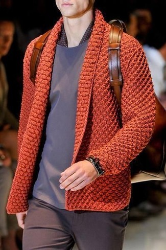 Tobacco Leather Backpack Outfits For Men: An orange knit cardigan and a tobacco leather backpack are great menswear staples that will integrate well within your day-to-day casual arsenal.