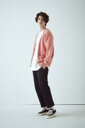 Hot Pink Cardigan Outfits For Men: A hot pink cardigan and black chinos are both versatile menswear essentials that will integrate really well within your daily casual collection. Take this getup a more casual path with black and white canvas low top sneakers.