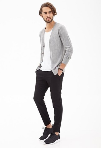 Black and White Athletic Shoes Outfits For Men: A grey cardigan and black chinos are great menswear staples that will integrate perfectly within your casual styling routine. A great pair of black and white athletic shoes is an easy way to bring a touch of stylish effortlessness to your ensemble.