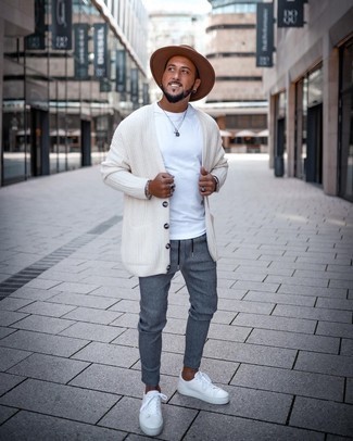 Brown Wool Hat Outfits For Men: This off-duty combo of a white cardigan and a brown wool hat is super easy to put together without a second thought, helping you look awesome and ready for anything without spending too much time searching through your closet. For something more on the elegant end to complement this look, complement your outfit with a pair of white canvas low top sneakers.