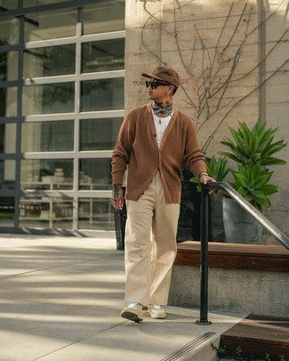 Dark Brown Cardigan Outfits For Men: If you're scouting for a laid-back and at the same time stylish look, opt for a dark brown cardigan and khaki chinos. Why not complement your ensemble with a pair of beige leather low top sneakers for a mellow feel?