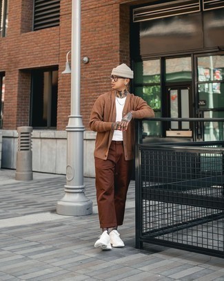 Beige Beanie Outfits For Men: This edgy combination of a brown cardigan and a beige beanie is very easy to pull together without a second thought, helping you look seriously stylish and ready for anything without spending too much time digging through your wardrobe. Complement this ensemble with white athletic shoes and ta-da: your look is complete.