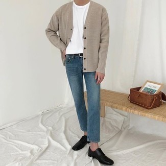 Beige Cardigan Outfits For Men: This combination of a beige cardigan and blue jeans is an interesting balance between laid-back and dapper. To give your outfit a more elegant finish, introduce a pair of black leather derby shoes to the mix.